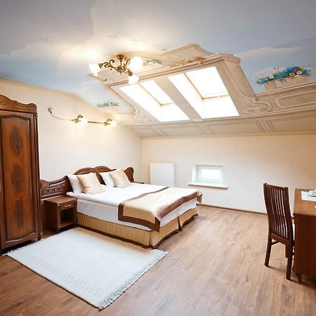 Mini-Hotel Guest House Inn Lvov Pokoj fotografie