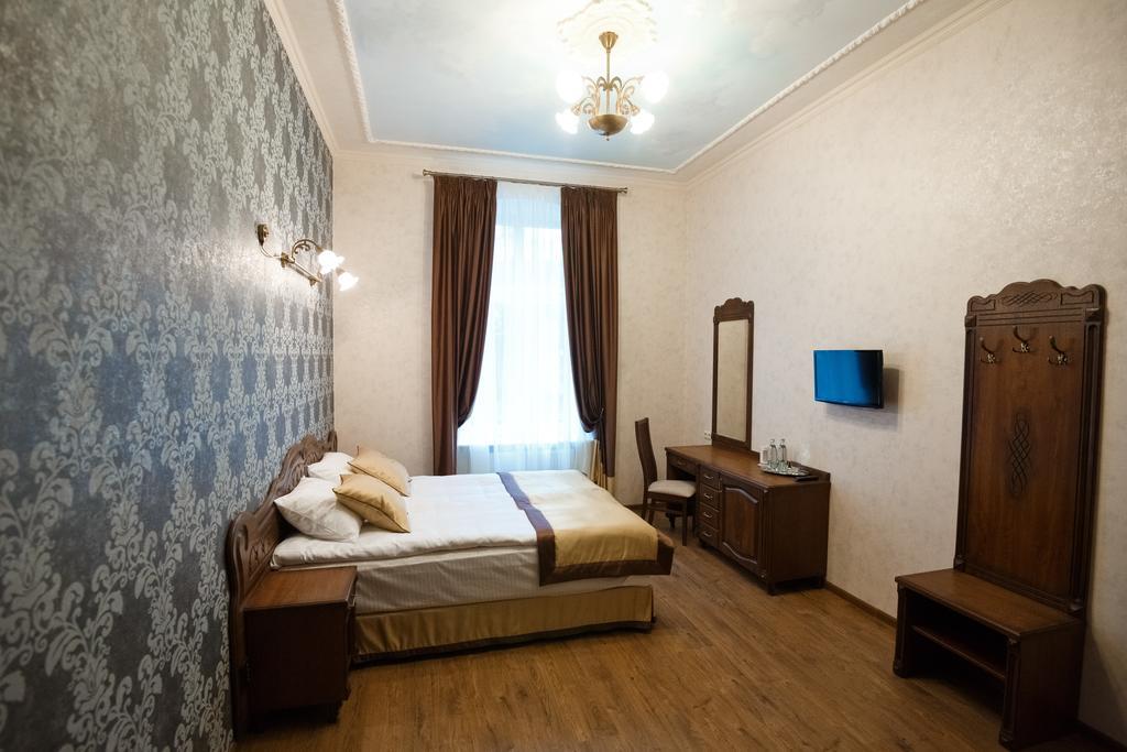 Mini-Hotel Guest House Inn Lvov Pokoj fotografie