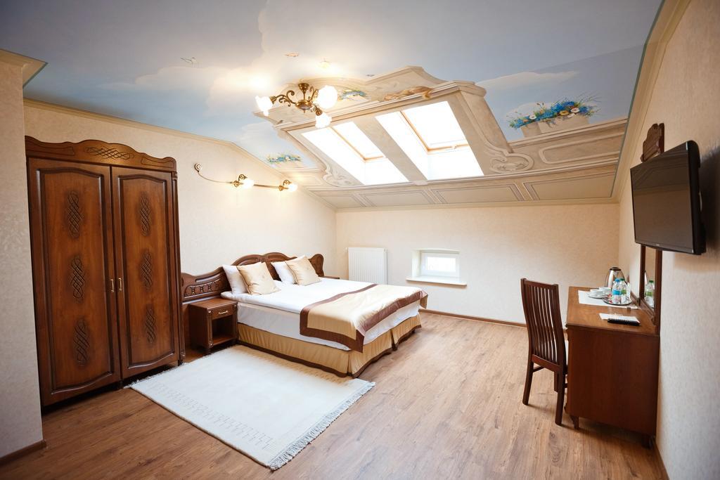 Mini-Hotel Guest House Inn Lvov Pokoj fotografie