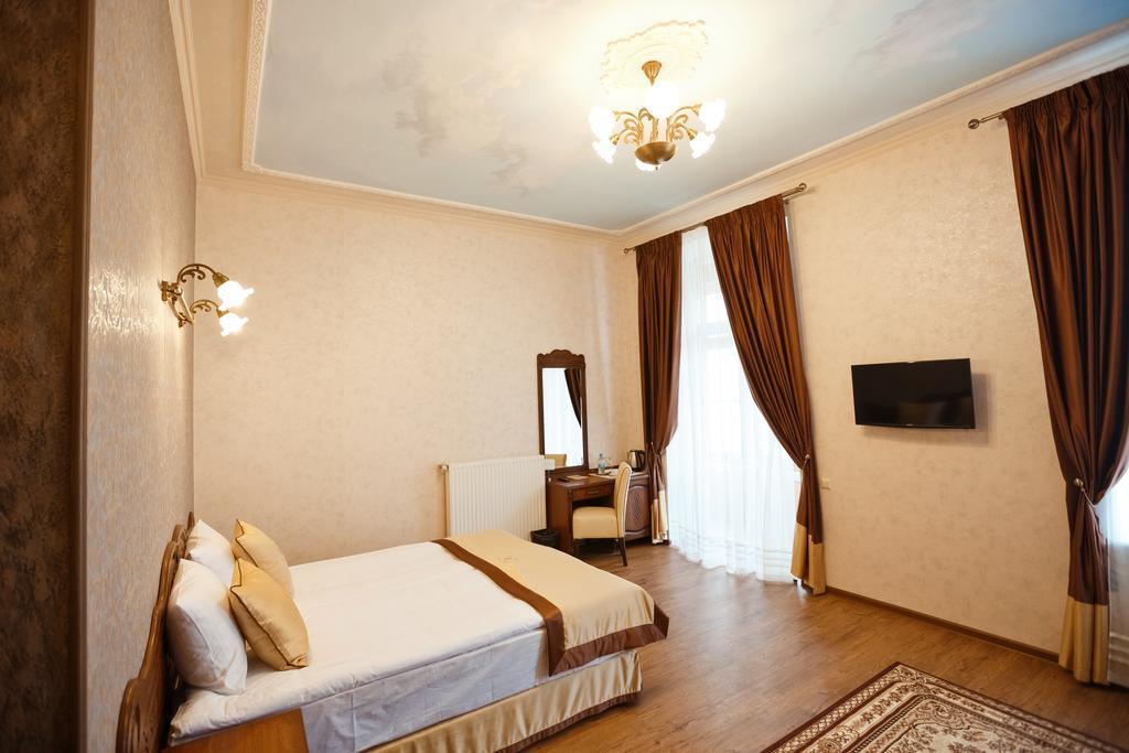 Mini-Hotel Guest House Inn Lvov Pokoj fotografie